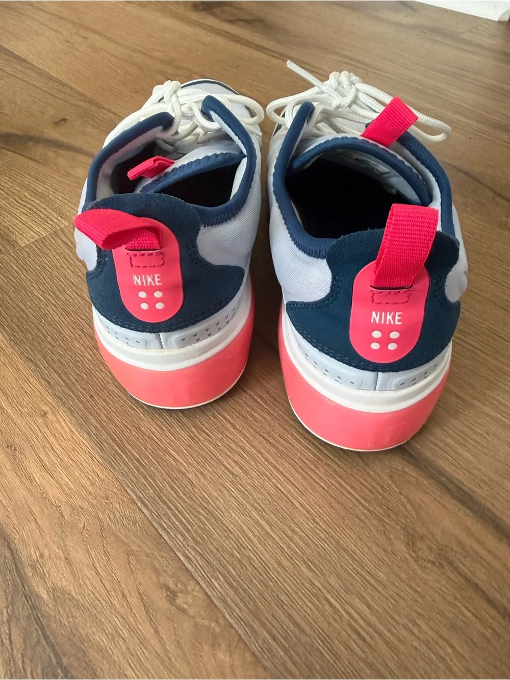 Nike Women's White Sneakers with Navy Trim and Pink Heel
